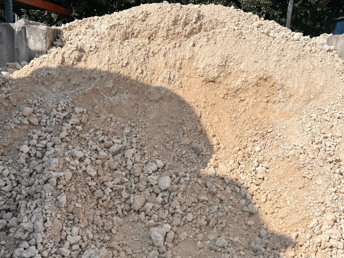 Crushed limestone road base stockpiled for the next job